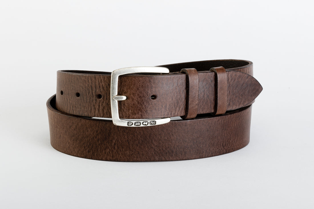 Unisex Genuine Leather Belt - HIP HUGGER BELT by TAFTIK – Hipster Elegance with Antique Silver Stamped Buckle and Wax Finish. An accessory that evolves with you: the wax finish deepens the color over time. Available in 4 Color Variants. Height 4 cm.